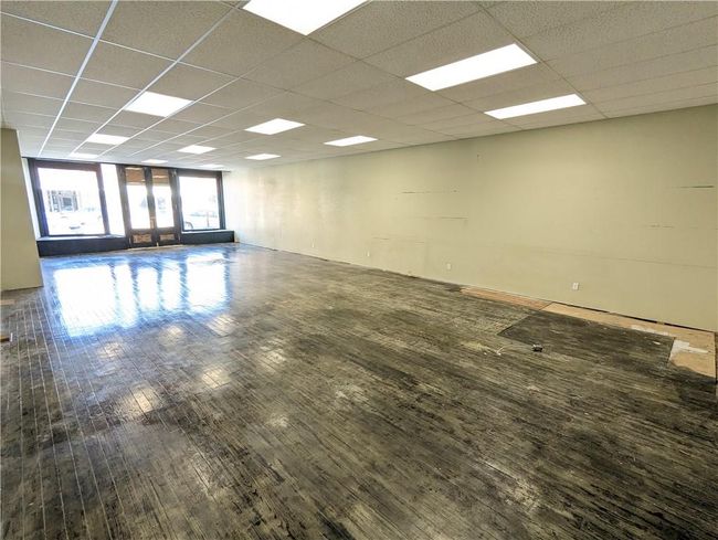 Spare room with dark hardwood / wood-style flooring and a drop ceiling | Image 11