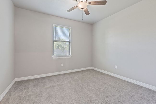 Empty room featuring carpet and ceiling fan | Image 27