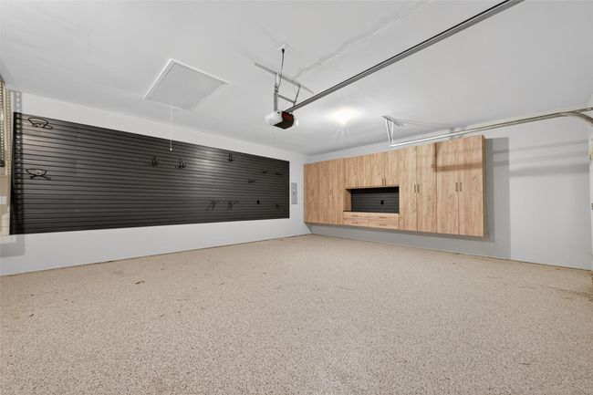 3 Car- Garage with... you guessed it, MORE built-ins for storage, and an organization wall. | Image 46
