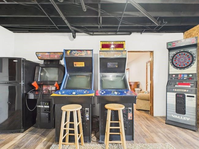 Game room featuring wood finished floors | Image 63