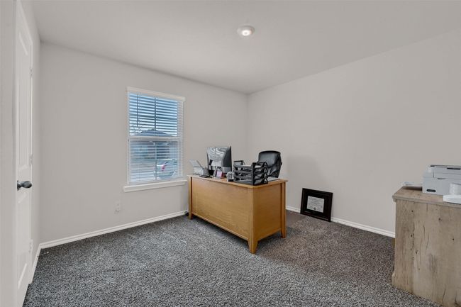 Office space featuring carpet flooring | Image 26