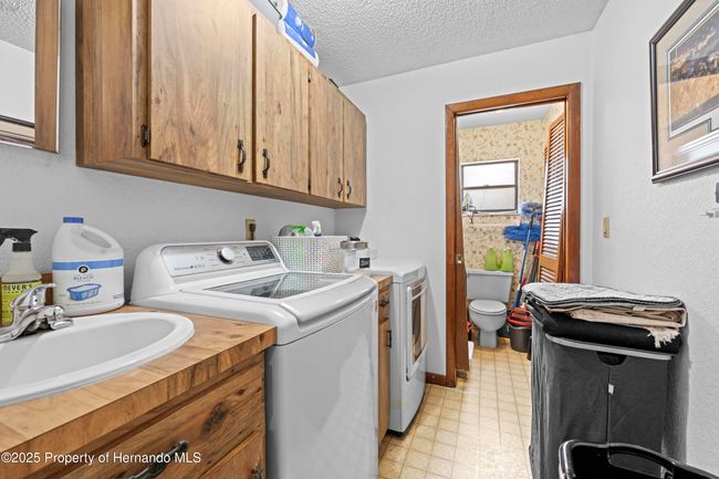 8268 Garrison St, House other with 3 bedrooms, 3 bathrooms and null parking in Spring Hill FL | Image 43