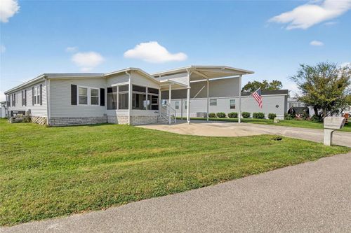 4945 Shore Line Dr, POLK CITY, FL, 33868-9306 | Card Image