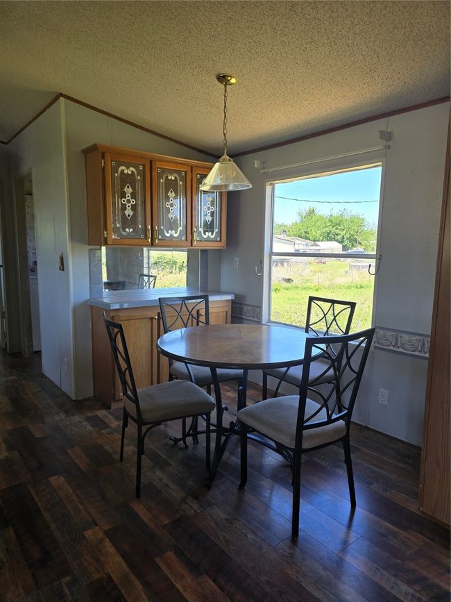 7077 Aztec Trl, House other with 3 bedrooms, 2 bathrooms and null parking in Weatherford TX | Image 6