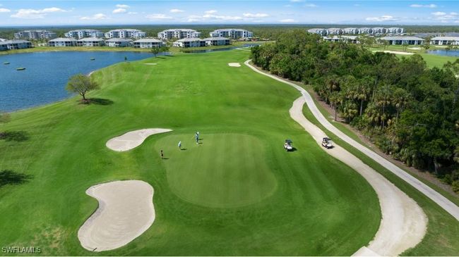 Birds eye view of property featuring a water view and view of golf course | Image 42