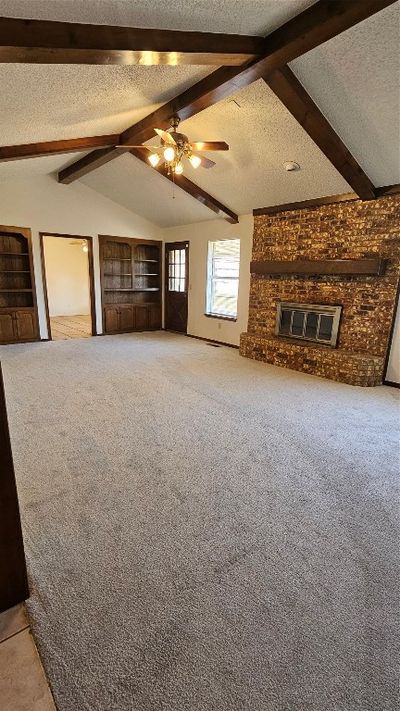 Living Room with Beautiful Woodbeams | Image 2