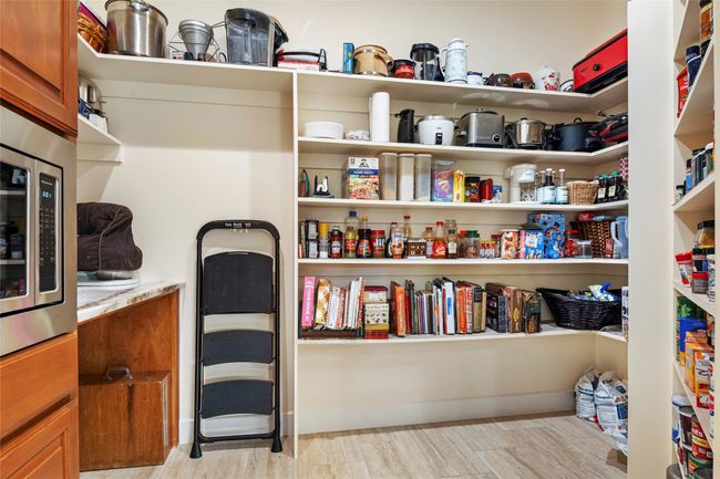 What a pantry! Built-in microwave, marble countertop, and tons of storage | Image 11