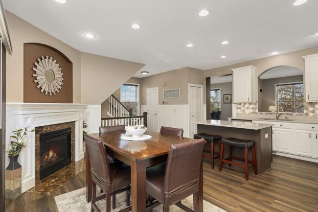Eat in kitchen area with gas fireplace | Image 9