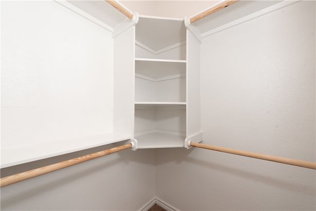 View of spacious closet | Image 13