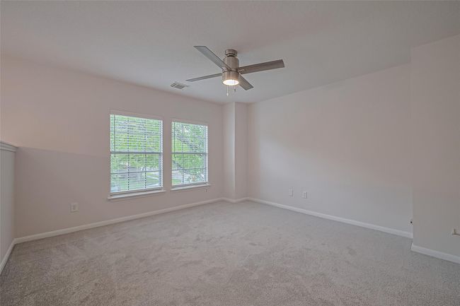 Upstairs loft area features all new carpet, freshly painted walls and ceilings, and offers a versatile space for lounging, working, or play. | Image 23