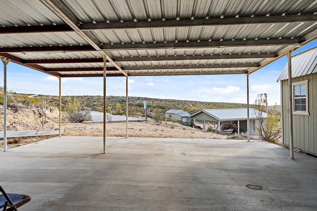 View of patio with a carport | Image 16