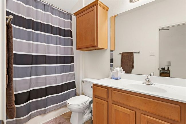 Convenient second bathroom, ideally located next to the second bedroom for easy access. | Image 16