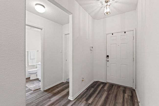 Both secondary bedrooms and guest bath are located at the front of the home off the entry hall. | Image 22