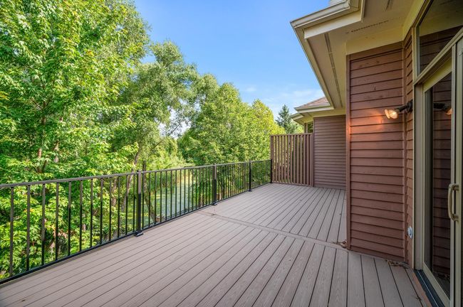 Generous composite decking makes a great spot to host BBQs while enjoying your private backyard. | Image 23