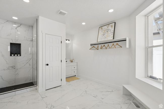 Mudroom featuring light marble finish floors, recessed lighting, and baseboards | Image 22