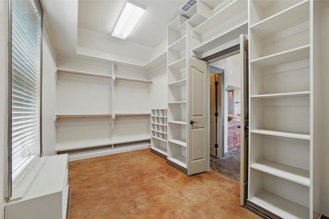 Spacious closet featuring carpet | Image 18