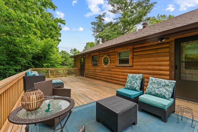 Relax on your expansive back deck surrounded by trees and occasional wildlife sightings. | Image 5