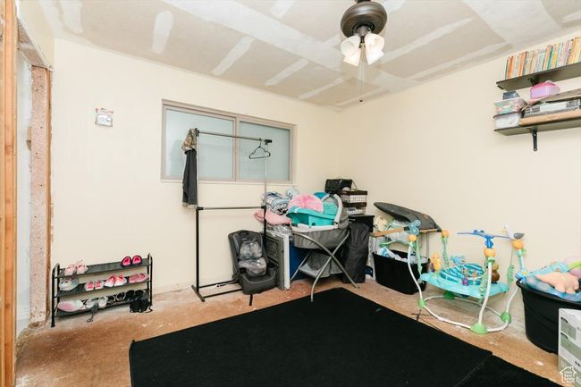 Interior space featuring a ceiling fan | Image 27