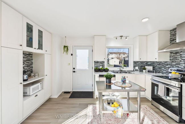 24 Mckeown Cres, House attached with 3 bedrooms, 2 bathrooms and 4 parking in Amherstview ON | Image 21