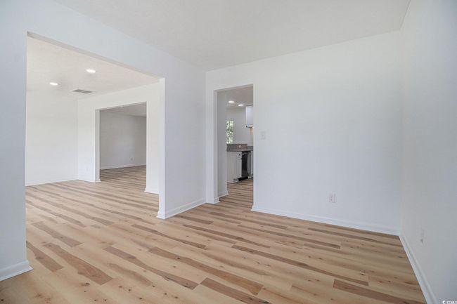 View from corner of Dining Room and/or Flex Room. All interior walls have been freshly painted throughout the home. | Image 13
