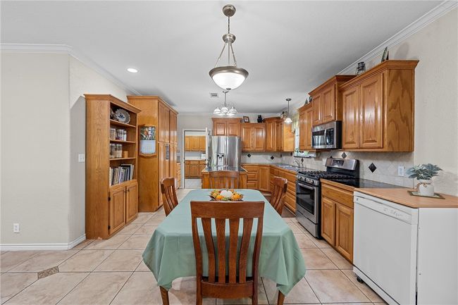 Large kitchen/dining combo. | Image 10
