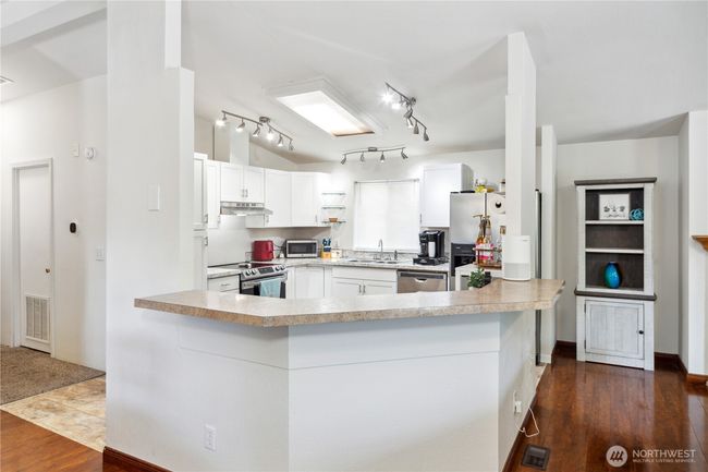 Open concept kitchen with bar counter | Image 8
