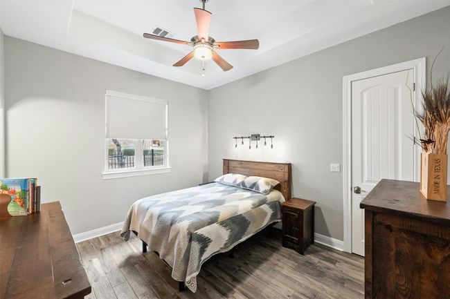 Additional bedroom with lots of space and natural light. | Image 30