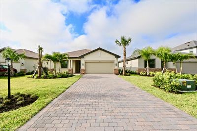 18293 Ridgeline Dr, House other with 3 bedrooms, 3 bathrooms and null parking in Estero FL | Image 2