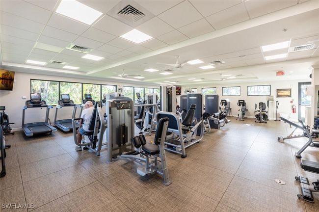 Gym featuring baseboards, visible vents, and a drop ceiling | Image 34