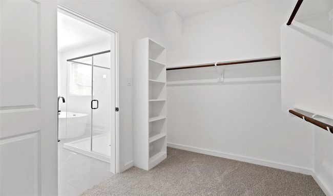 Walk-in closet in the primary suiteRelaxing primary bath (*Photo not of actual home and used for illustration purposes only.) | Image 13