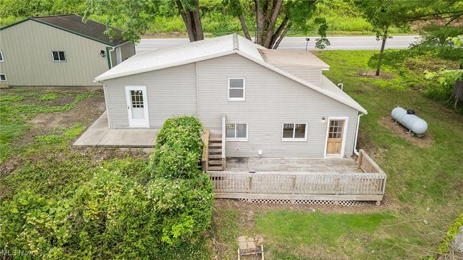Back of property featuring a deck | Image 27
