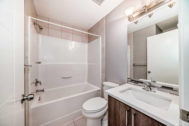 23 Baysprings Way Sw, Home with 3 bedrooms, 3 bathrooms and 1 parking in Airdrie AB | Image 36