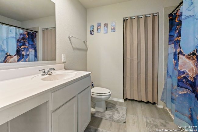 14550 Open Range Rd, House other with 4 bedrooms, 3 bathrooms and null parking in Lytle TX | Image 12