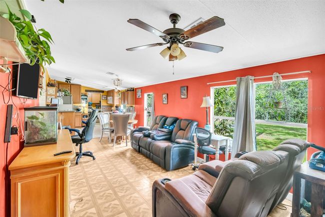 Fam Rm View into dining and kitchen | Image 5