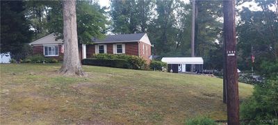 Property entrance featuring covered porch | Image 3