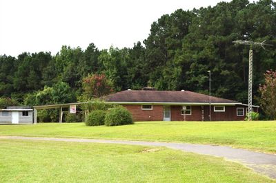 View of home's yard ! It sits way back off the road | Image 1