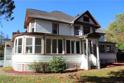 View of front of house with a sunroom | Image 2