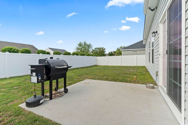 View of patio / terrace featuring a fenced backyard and grilling area | Image 33