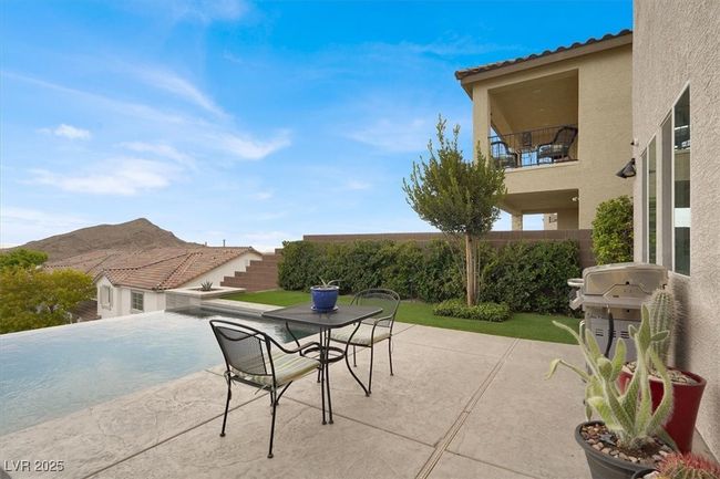Patio / terrace with grilling area and a patio area | Image 57