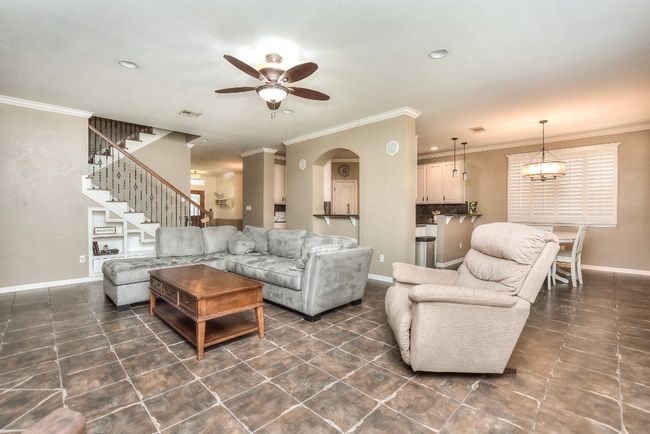 Note that the family room is open to the kitchen and breakfast area | Image 11