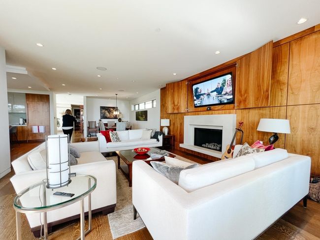 Living room featuring a fireplace, recessed lighting, and wood finished floors | Image 7
