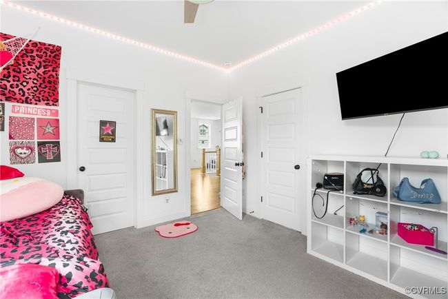 Bedroom featuring carpet floors and a ceiling fan | Image 26