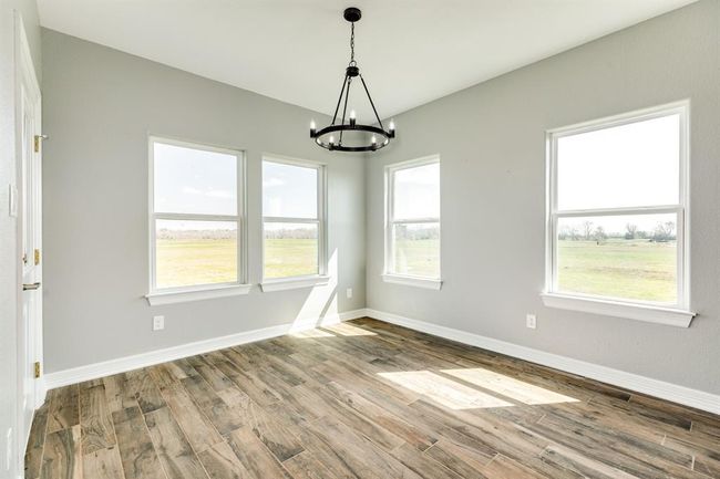 Enjoy the View While Eating in your Spacious Dining Area | Image 15
