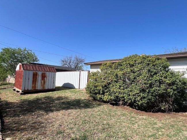 Yard Area behind backyard fence | Image 37