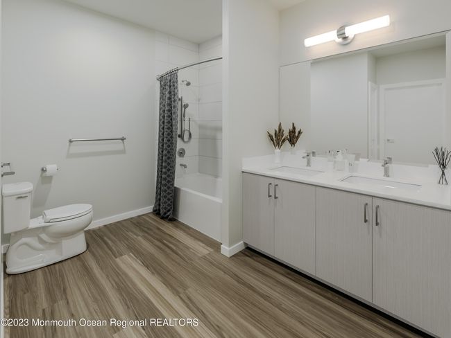 Full bath with dual vanities | Image 4
