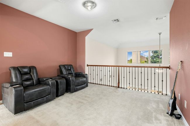 Large bonus room upstairs to enjoy movies, games and much more. | Image 20