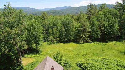 White Mt National Forest views from this historic farmhouse from Mt Tecumseh, to Welch/Dickey, Tripyramid, Noon Peak, Sandwich Dome beyond make this a very special/unique property &lt; 2mi from Waterville Valley exit 28 off I-93 | Image 3