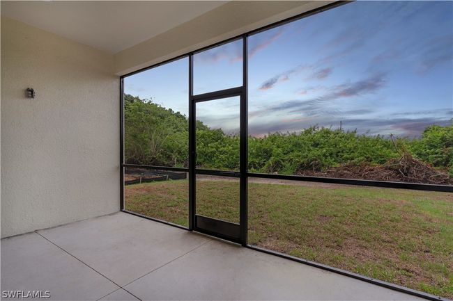 View of unfurnished sunroom | Image 9