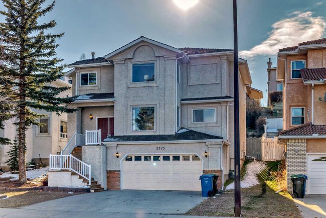 2775 Signal Hill Drive Sw, Home with 4 bedrooms, 3 bathrooms and 4 parking in Calgary AB | Image 2