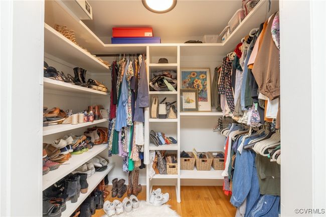 Spacious closet featuring wood finished floors | Image 29